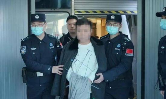 Red Notice fugitive repatriated to China from Indonesia after 11 years on the run