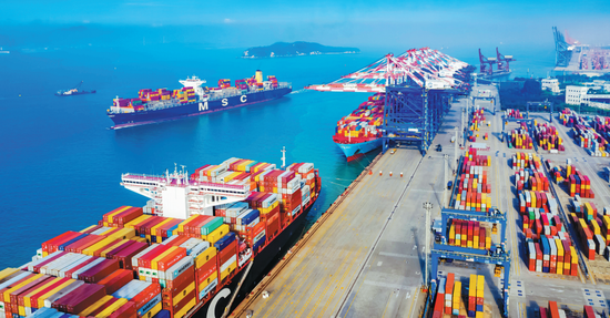 This undated file photo shows containers awaiting shipping at a port in Xiamen. (Photo by Wang XieYun/China Daily)