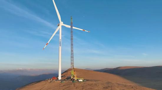 Highest, largest wind farm installs first turbine in Himalayas