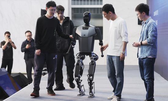 Chinese company unveils humanoid running robot with large-scale commercial potential