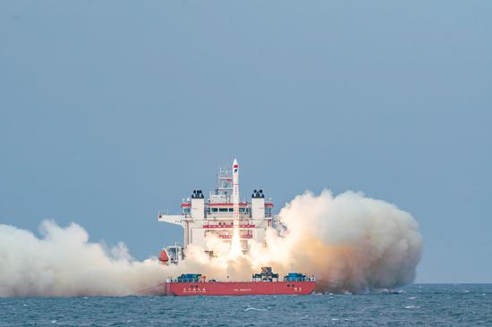 China sends four satellites from sea