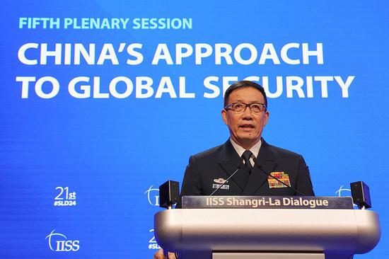 China's defense minister vows no tolerance for war or chaos in Asia-Pacific