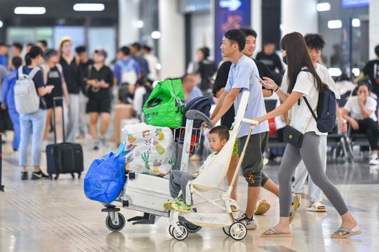 Airport in Haikou resumes operation after super typhoon