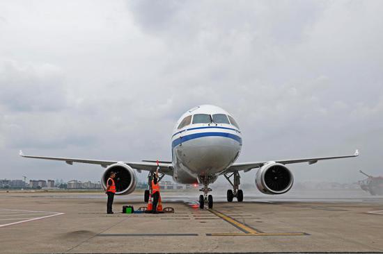 Air China's first C919 aircraft makes maiden flight