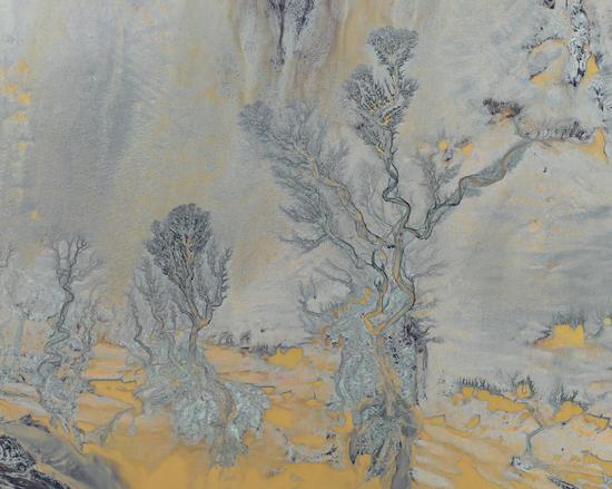 Natural patterns left on riverbed of Qiangtang River