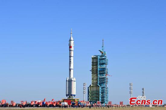 The combination of the Shenzhou-19 crewed spaceship and a Long March-2F carrier rocket has been transferred to the launch area, Oct. 22, 2024. (Photo provided to China News Service by Wang Jiangbo)