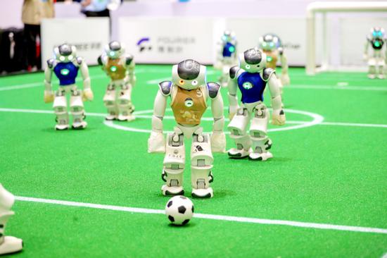 Humanoid robots play football in Qingdao