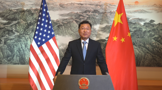 Chinese Ambassador to the United States Xie Feng delivers a video speech at a US-China Business Council reception dinner in Shanghai on Thursday to commemorate the 45th anniversary of US-China diplomatic relations. (Provided to China Daily)