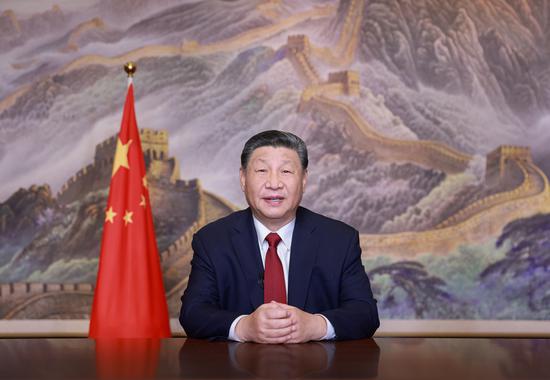 Chinese President Xi Jinping delivers a New Year message via China Media Group and the Internet Sunday evening in Beijing to ring in 2024. (Xinhua/Ju Peng)