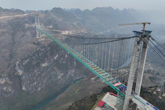 World's tallest bridge connected in Guizhou