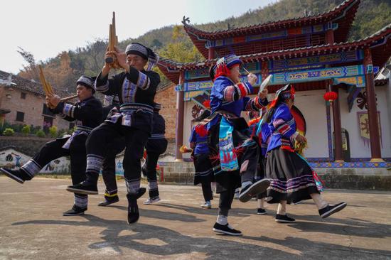 Villagers perform Long Drum Dance to mark Spring Festival in Guangxi