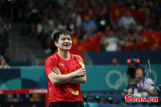 Fan Zhendong of China celebrates after the table tennis men's singles final at the Paris Olympics, France, Aug. 4, 2024. (Photo: China News Service/Fu Tian)