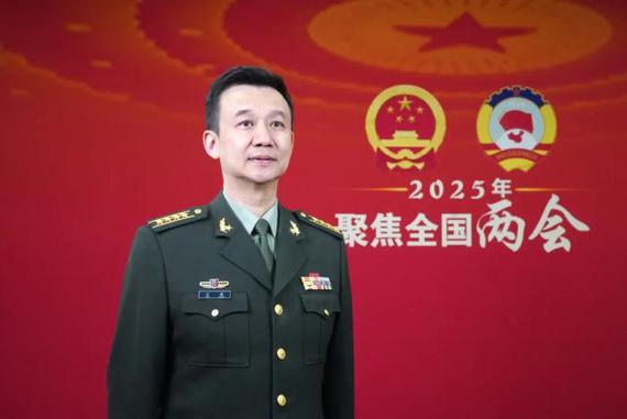Wu Qian, spokesperson for the delegation of the People's Liberation Army and the People's Armed Police Force, receives an interview during the annual national legislative session in Beijing, March 9, 2025. (Photo /China News Service) Wu Qian, spokesperson for the delegation of the People's Liberation Army and the People's Armed Police Force, receives an interview during the annual national legislative session in Beijing, March 9, 2025. (Photo /China News Service)