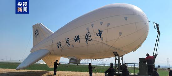 A tethered balloon is deployed at the site of a 500-kilovolt power transmission project for a UHV converter station in Tai'an, Shandong Province, March 19, 2025. (Photo/CCTV News) A tethered balloon is deployed at the site of a 500-kilovolt power transmission project for a UHV converter station in Tai'an, Shandong Province, March 19, 2025. (Photo/CCTV News)