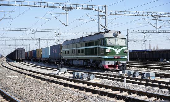 The 90,000th China-Europe freight train processed via Xinjiang's two rail ports prepares to depart from Horgos Station on March 23, 2025. (Photo/Courtesy of China Railway Urumqi Group Co)