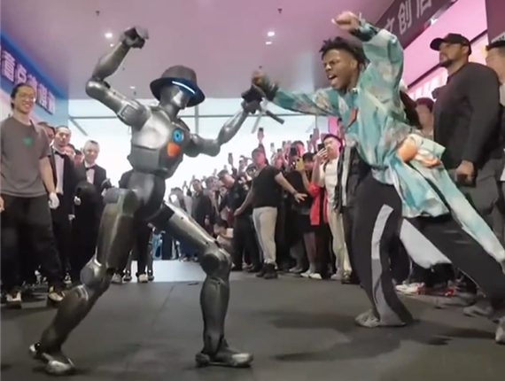 Speed dances with a robot produced by EngineAI in Oh Bay, Shenzhen, Guangdong Province, April 5, 2025. (Photo: Video screenshot)
