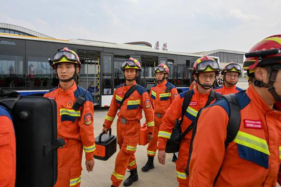 China's Yunnan rescue team returns from Myanmar