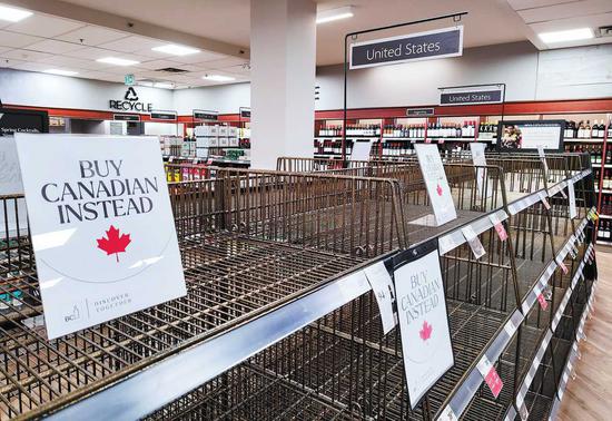 U.S. products are cleared from supermarket shelves in Vancouver, Canada, on March 28. Amid escalating tariff tensions, many Canadian retailers have slashed imports of U.S. goods, urging consumers to