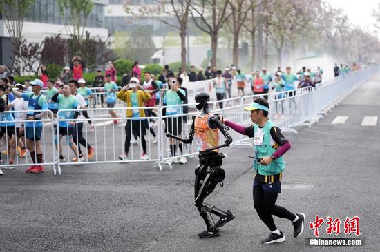 China-made humanoid robot Tien Kung Ultra wins champion in world's first humanoid robot half-marathon in Beijing
