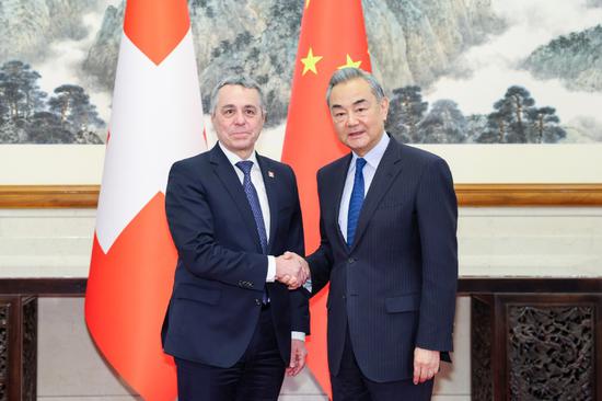Wang: China, Switzerland must work together to uphold multilateralism, free trade