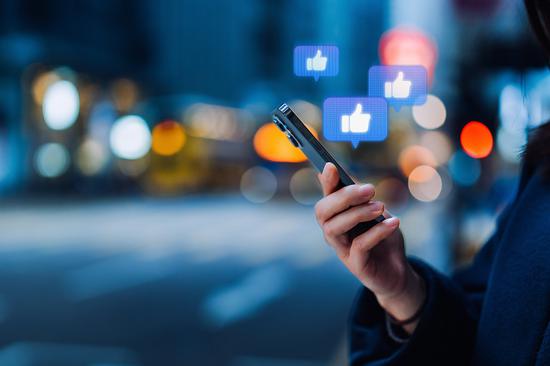 Police bust online operation boosting posts with fake accounts