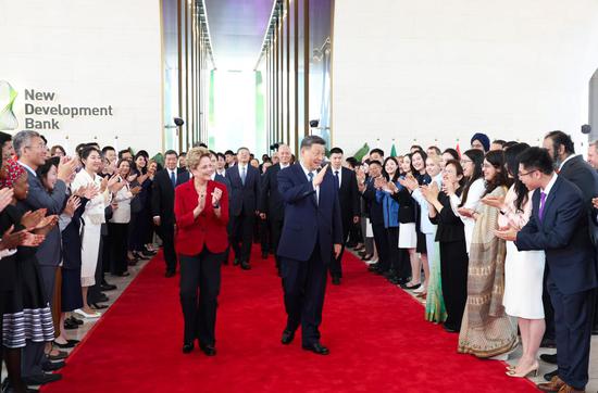 Chinese President Xi Jinping visits the New Development Bank and meets with Dilma Rousseff, president of the institution, in Shanghai, east China, April 29, 2025. (Xinhua/Huang Jingwen)