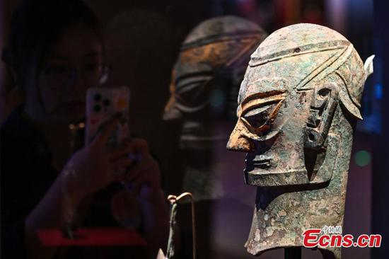 Visitors view an exhibit at "The Exhibition Series on the Origins of Chinese Civilization: This is the Shang" at the Grand Canal Museum of Beijing, May 18, 2025. (Photo/China News Service)