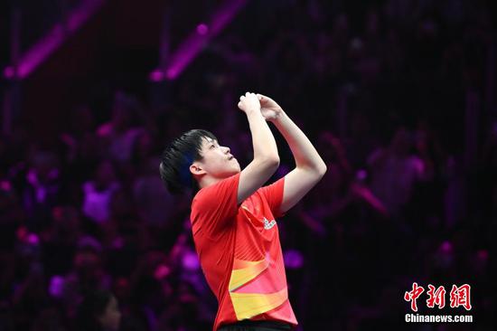 Photo shows Wang Chuqin in the match of WTT Champions Chongqing 2025, March 16, 2025. (Photo/China News Service)