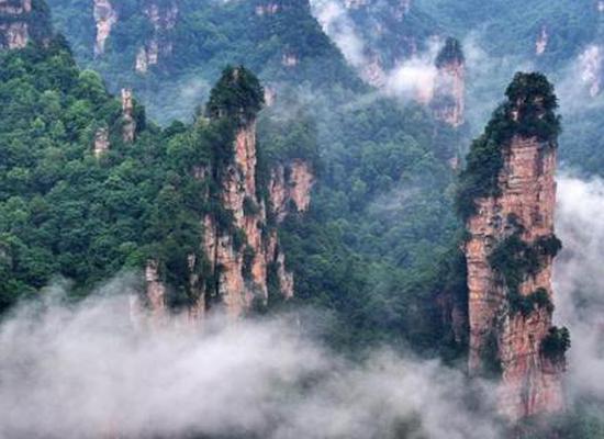 'Avatar' mountains in Zhangjiajie enveloped in clouds