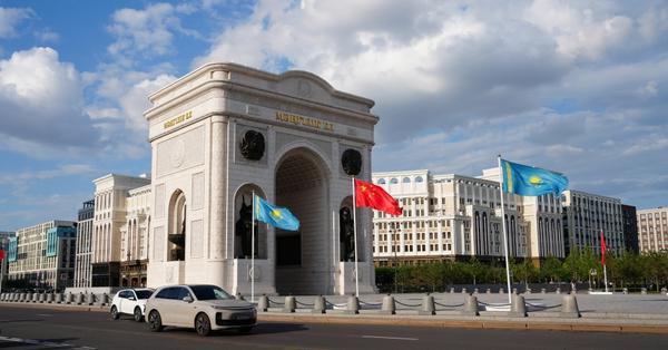 National flags of China and Kazakhstan flutter along streets of Astana