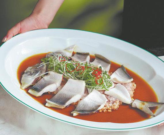 Steamed White Pomfret with Marinated Pork Bone Sauce. (Photo provided to China Daily)