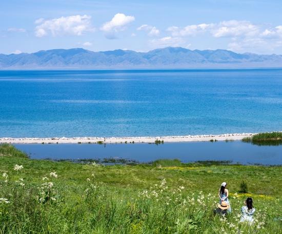 Clear Sayram Lake welcomes vibrant Summer