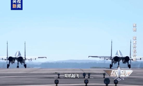 Chinese state media reveals J-16, J-15 fighter jets resolutely react to foreign provocations