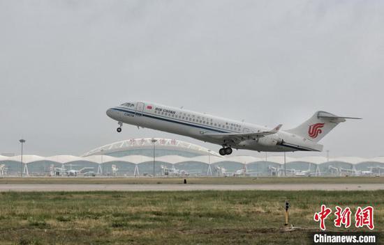 Chinese-made aircraft C909 flies national flag on first international commercial route
