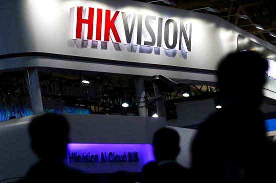 China vows to protect businesses after Canada orders closure of Hikvision