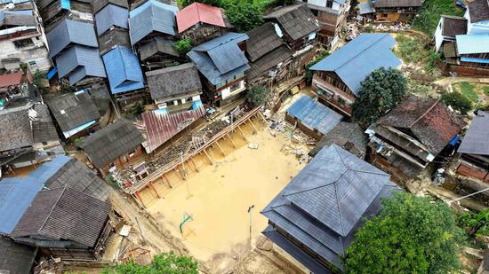 S China’s Guangxi clears silt after torrential rains