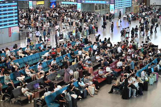 China sees over 300 million railway passenger trips in summer rush
