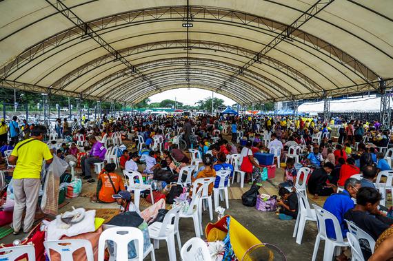 People rest at a shelter in Buriram Province, Thailand, on July 24, 2025. (Photo/China News Service)