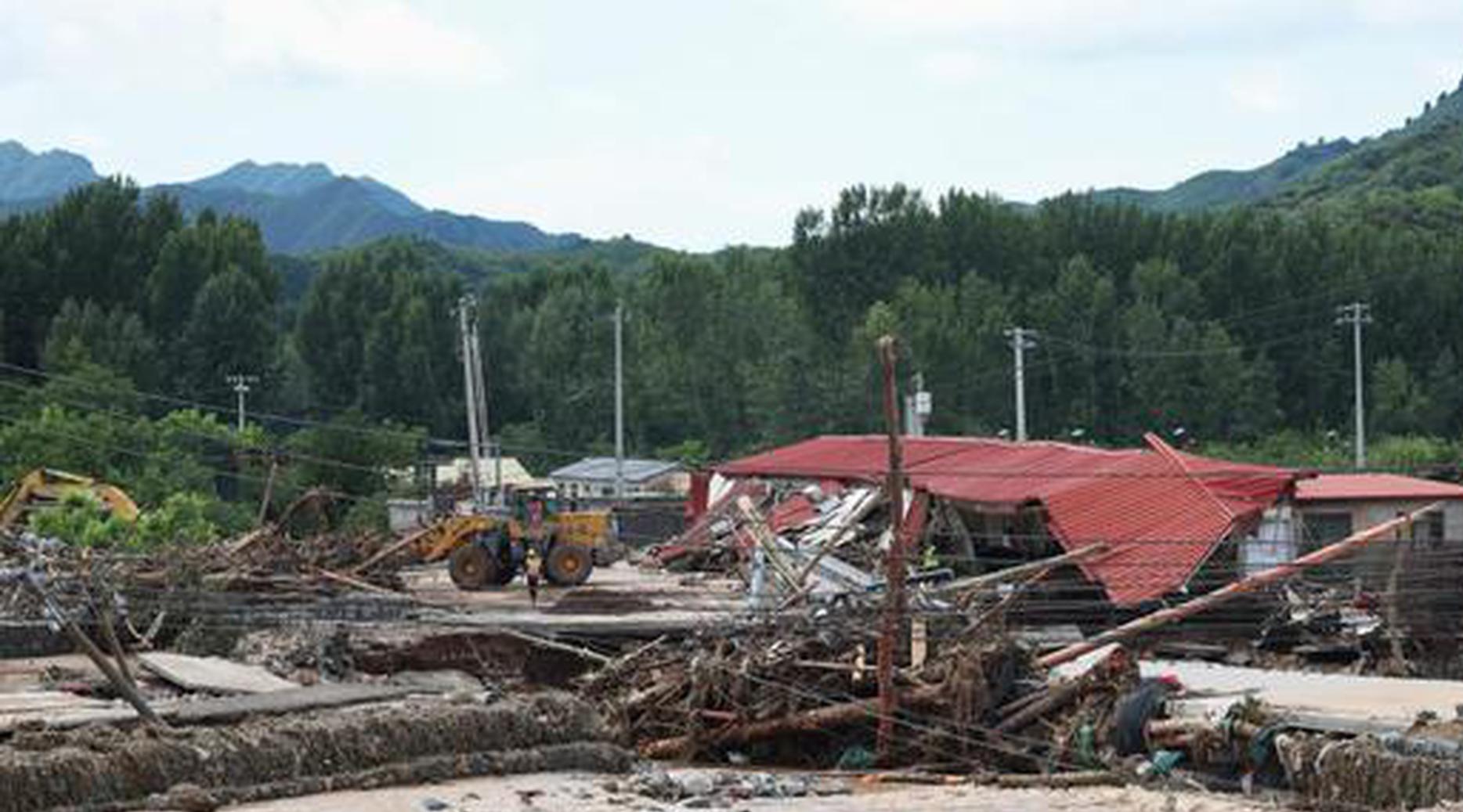 Beijing issues red alert for rainstorms in five districts