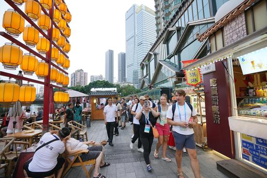 Athletes experience local life ahead of World Games in SW China's Chengdu