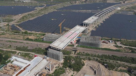Massive 20,000-metric-ton bridge rotated to place in central China