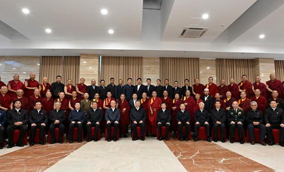 Chinese President Xi Jinping, also general secretary of the Communist Party of China Central Committee and chairman of the Central Military Commission, poses for a group photo while meeting with representatives of patriotic members of the religious circles in Lhasa, southwest China's Xizang Autonomous Region, Aug. 20, 2025. (Xinhua/Li Xiang)