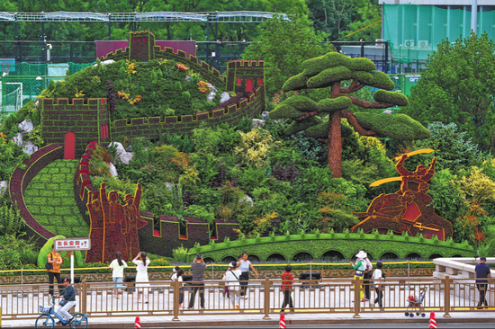 Avenue blooms with flowers to mark victory