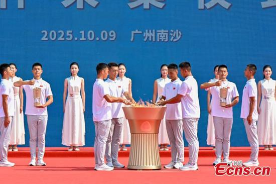 The flame lighting ceremony for the 15th National Games and the 12th National Games for Persons with Disabilities & 9th Special Olympics took place at the Guangzhou Marine Geological Survey scientific research wharf in Guangdong Province, Oct. 9, 2025. (Photo: China News Service/Chen Jimin)