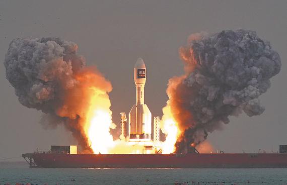 The Gravity 1 carrier rocket blasts off at 10:20 am on Saturday from waters off the coast of Haiyang, Shandong province, placing three satellites into their designated orbits. TANG KE/FOR CHINA DAILY
