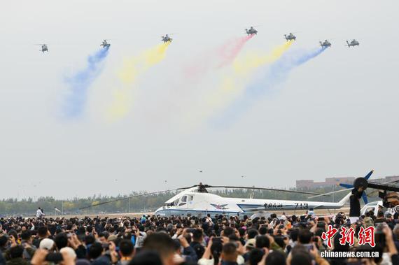 Helicopters of Fenglei aerobatic team of the Chinese People's Liberation Army (PLA) perform during the opening ceremony of the 7th China Helicopter Exposition in north China's Tianjin Municipality, Oct. 16, 2025. (Photo: China News Service/Tong Yu) Helicopters of Fenglei aerobatic team of the Chinese People's Liberation Army (PLA) perform during the opening ceremony of the 7th China Helicopter Exposition in north China's Tianjin Municipality, Oct. 16, 2025. (Photo: China News Service/Tong Yu)
