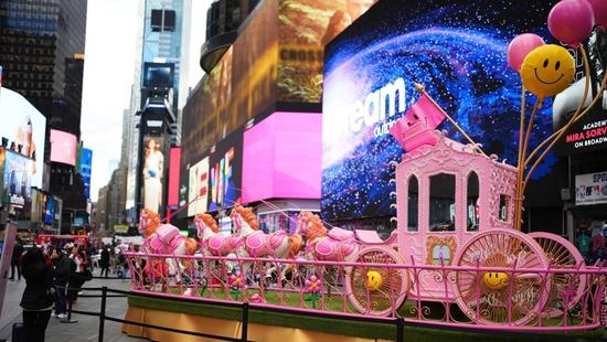 'Magic Grasshopper' appears in New York's Times Square