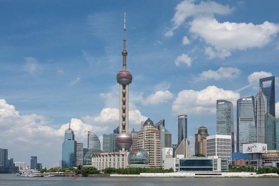 China to improve financial services further: official