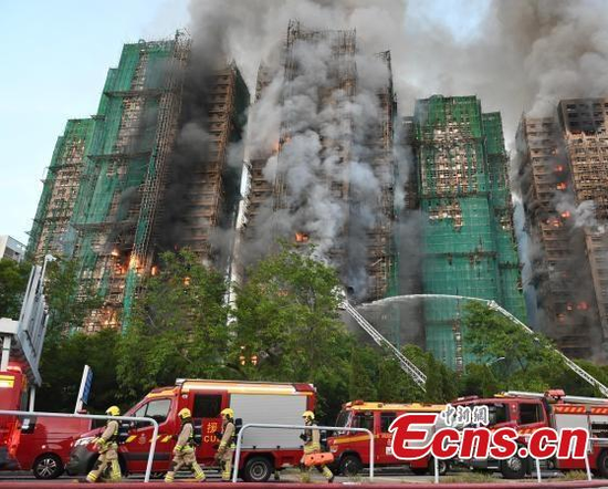 Hong Kong fire death toll climbs to 128, with more bodies to be found