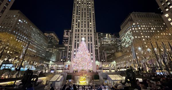 Rockefeller Center Christmas tree illuminated in New York